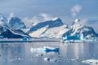 Antarctica, Port Charcot. Mountain and iceberg landscape. Art Print